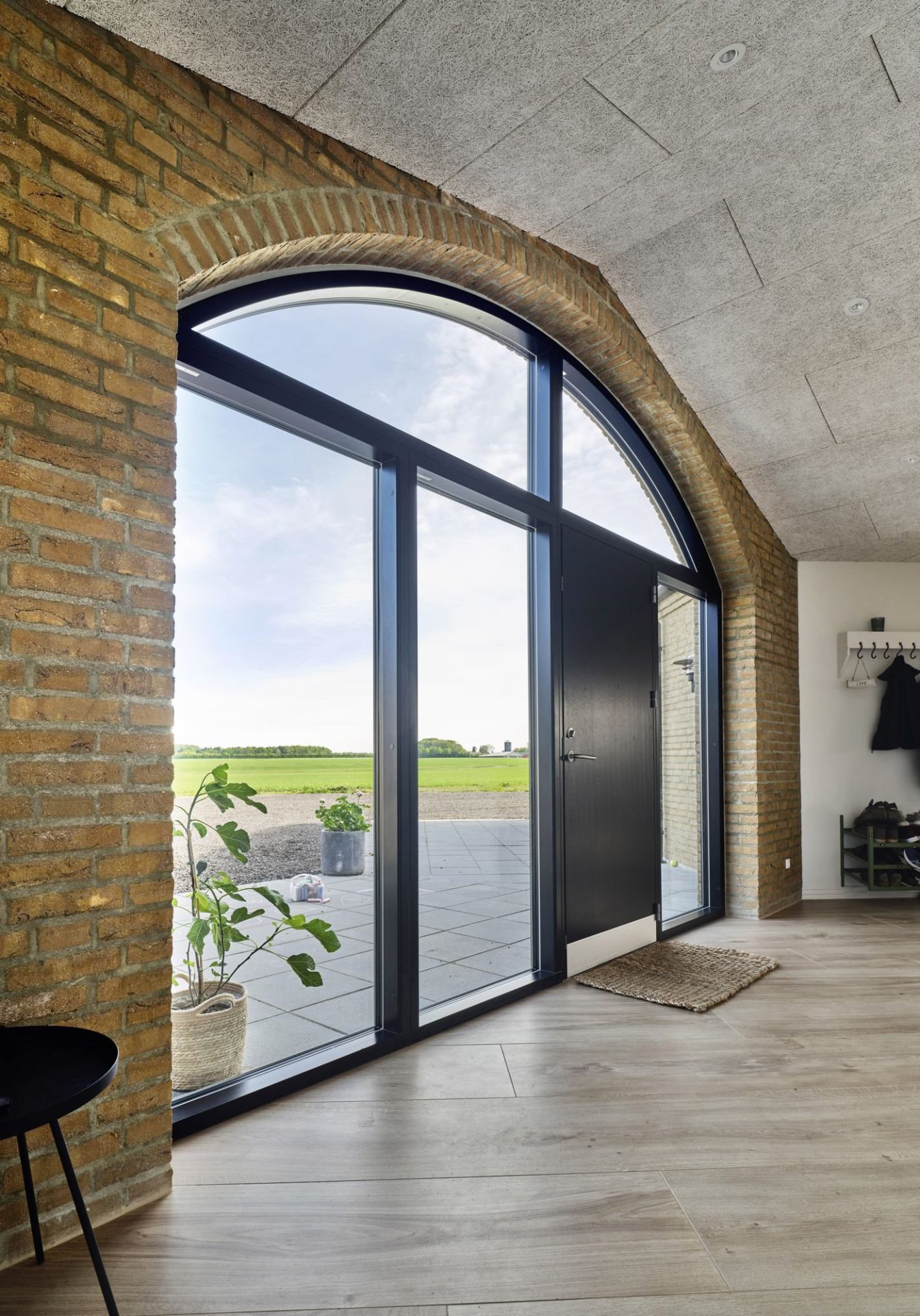Black painted VELFAC Classic arched door and side light